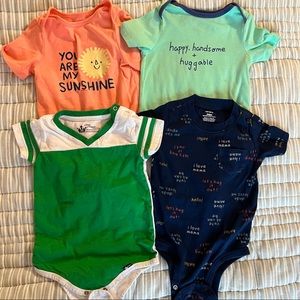 Cat and Jack/Carter’s set of 4 bodysuits 24m